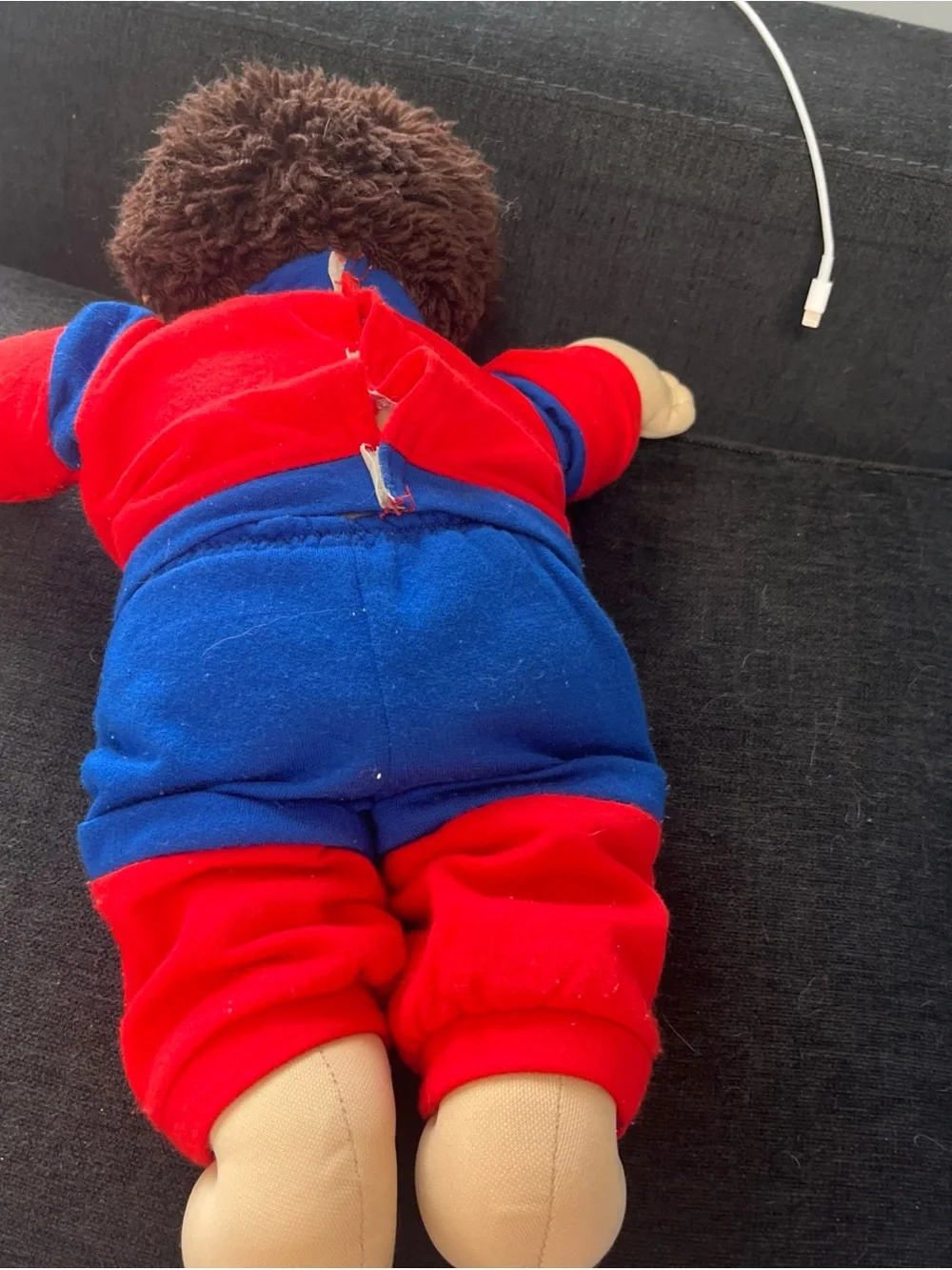 Cabbage Patch Kid with short clipped hair in sweats outfit